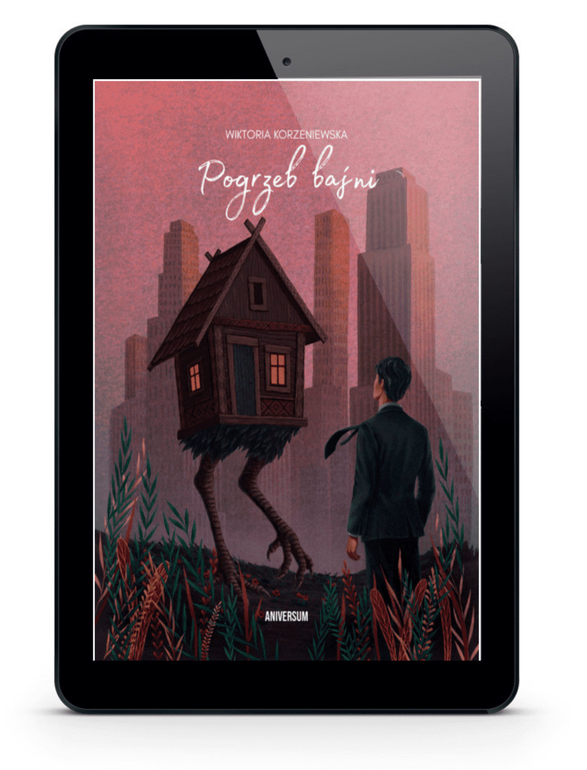 OKŁADKA _ POGRZEB.zip - 3 Okładka książki Pogrzeb baśni autorstwa Wiktorii Korzeniewskiej, przedstawiona na ekranie czytnika e-book. Ilustracja ukazuje drewniany domek na kurzych łapach na tle nowoczesnych wieżowców, z przodu stoi mężczyzna w garniturze. U dołu widoczne logo wydawnictwa ANIVERSUM.